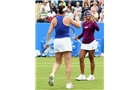 BIRMINGHAM, ENGLAND - JUNE 15:  Raquel Kops-Jones and Abigail Spears (L) of the United States celebrate victory in the Doubles Final during Day Seven of the Aegon Classic at Edgbaston Priory Club on June 15, 2014 in Birmingham, England.  (Photo by Tom Dulat/Getty Images)